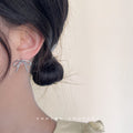 Minimal Wire Bow Stud Earrings Gold and Silver Tones view 3