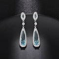 Pale Blue Long Pear-Shaped Halo Drop Earrings Silver Tone view 1