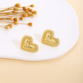 Thirty Gold Tone Sculptural Leaf Heart Shell and Geometric Earrings view 7