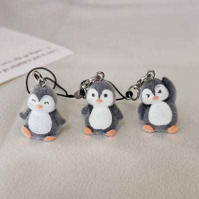 Main product view of flocked Penguin Phone Strap Charms in Three Distinct Poses