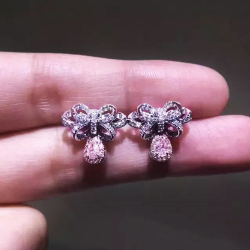 Pink Bow Crystal Drop Earrings in Silver Tone, front view.