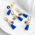 Gold-Tone Rhinestone Evil Eye Keychain with Blue Suede Tassel view 3