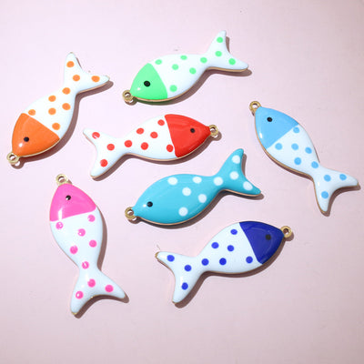 Grouped front view of polka dot enamel fish charms in eight color options