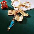 Mini Office Charm Keychain With Book, Pen, Briefcase and Taxi view 4