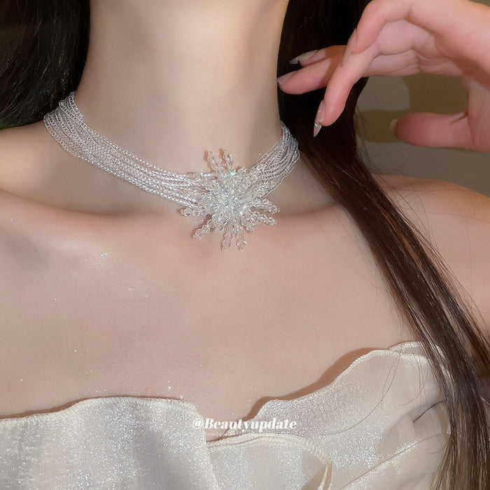 White Multi Strand Bead Necklace With Crystal Starburst