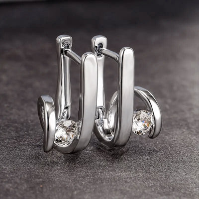 Front view of folded-bar studs with clear stone tips