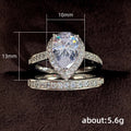 Pear-Shaped Solitaire Halo Two-Ring Set In Two Metal Tones view 5