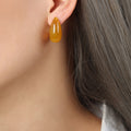 Amber Resin Teardrop Stud Earrings Glossy Curved Shape view 1