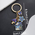 Blue Pink and Green Butterfly Mushroom House Keychains view 2