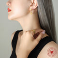 Asymmetric Liquid Drop Stud Earrings Gold And Steel Pair view 3