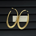 Polished Elongated Oval Hoop Earrings in Gold and Silver view 6