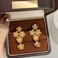 Gold Tone Crystal Flower Cluster Drop Earrings with Metal Tone Details view 3