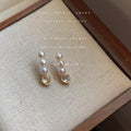 Gold Tone Triple Pearl And Clear Heart Drop Stud Earrings view 3