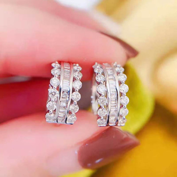 Silver Triple Row Pavé Huggie Hoop Earrings In A Polished Decorative Design