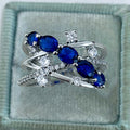 Silver Tone Blue Oval Crisscross Multi Band Ring Sizes 6-10 view 1