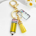 Acrylic Pencil And Notebook Charm Keychain With Yellow Suede Tassel view 1