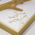 Gold Abstract Wire Drop Earrings With Teardrop Pearls view 4