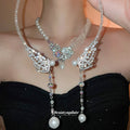 Silver Tone Pearl Wing Statement Necklace in Two Designs view 1