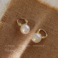 Gold Huggie Hoop Earrings Round White Pearl Drop Pair view 1