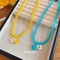 Double Strand Beaded Flower Necklace in Blue and Yellow view 2