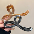 Marbled Loop Acrylic Hair Claw In Pale Pink Or Black view 4