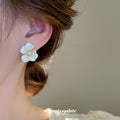 White Petal Flower Stud Earrings with Gold Tone Centers view 3