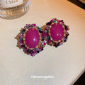 Pink Oval Crystal Vintage Style Stud Earrings with Polished Metal Accents view 4