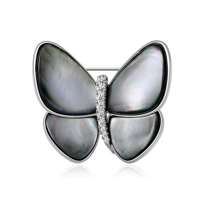 Front view of shell effect butterfly brooch against a white background.