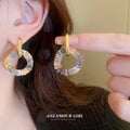 Gold Tone Hoop Earrings With Iridescent Crystal Fans view 2