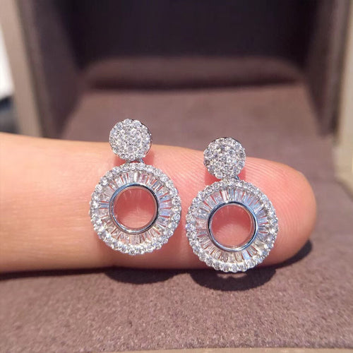 Round Open Center Pavé Stone Drop Stud Earrings in Silver Tone shown in product close-up
