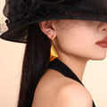 Gold Tone 3D Triangle Pyramid Drop Huggie Hoop Earrings view 3