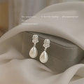 Silver Tone Clear Stone Top And Irregular White Pearl Stud Earrings view 1