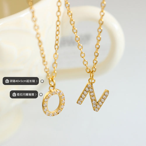 Close gold O and N zircon letter pendants length stone tags