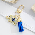 Gold-Tone Rhinestone Evil Eye Keychain with Blue Suede Tassel view 4