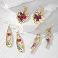 Gold Tone Pressed Flower Resin Drop Earrings in Three Designs view 1