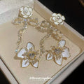 Floral Bow and Butterfly Drop Stud Earrings in Two Designs view 1