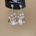 Pearl Circle White Tassel Drop Earrings with Gold Tone Details view 6
