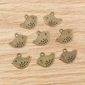 Perforated Bird Silhouette Charms in Two Antique Finishes view 6
