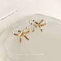 Gold 3D Cube Segment Bow Stud Earrings Geometric Pair view 4
