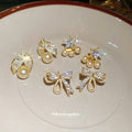 Gold Tone Bow and Pearl Stud Earrings in Three Designs view 3