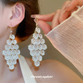 Gold Tone Crystal Leaf Cluster Hook Earrings With Teardrop Fringe view 1