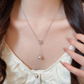 Bow And Pearl Drop Silver Tone Necklace In Three Colors view 4
