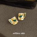 Gold Abstract Face Mask Stud Earrings Green Enamel Eyes view 4