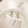 Polished Silver Petal Gold Center Flower Stud Earrings view 2