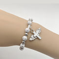 White Cross Bead Stretch Bracelet Winged Cross Charm view 4