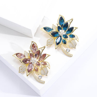 Grouped view of large Marquise Crystal Flower Brooch in Blue or Pink arranged together.