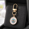 Gold Tone Crystal Round Evil Eye Clip Keychains in Five Colors view 8