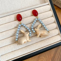 Red And White Rabbit Drop Earrings With Blue Pearl Frames view 6