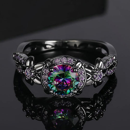 Front close-up of multicolor center stone halo on black finish band