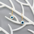 Gold Tone White and Blue Evil Eye Drop Earrings with Hooks view 4